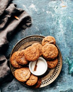 platter of cookies on top of blue surface